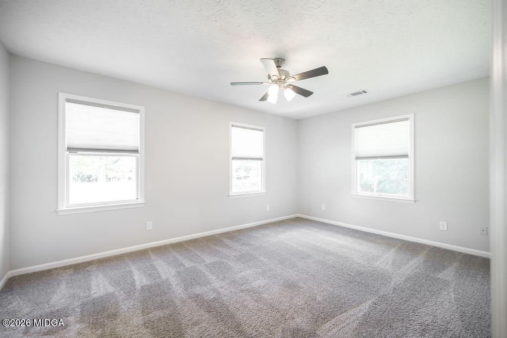 3365 Highway 80 Roberta, GA 31078 - Photo 18 of 41 a view of an empty room with a window