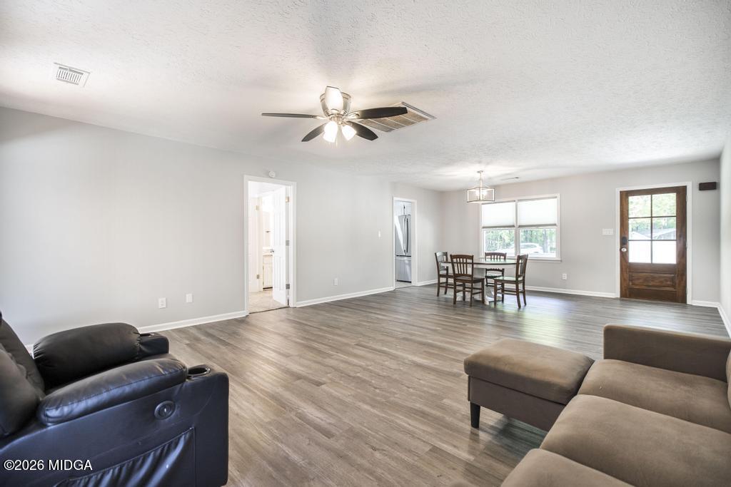 3365 Highway 80 Roberta, GA 31078 - Photo 9 of 41 a living room with furniture and wooden floor
