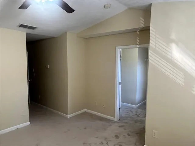 an empty room with a bathroom