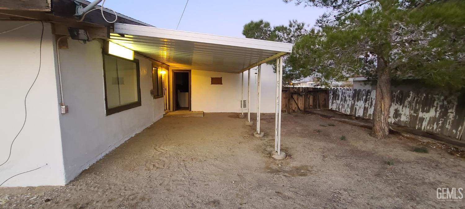 Undisclosed Address Trona, CA 93562 - Photo 23 of 27 a view of a house with a tree