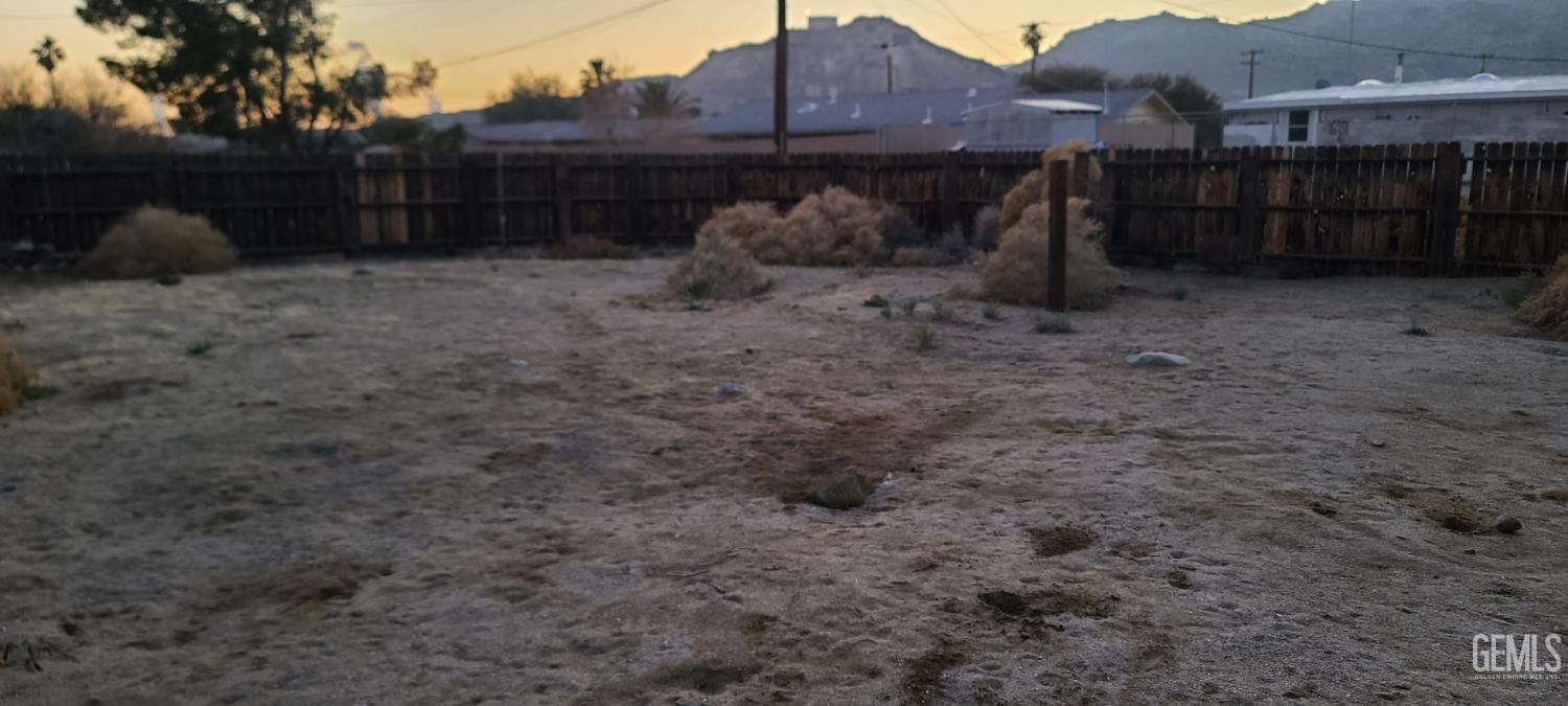 Undisclosed Address Trona, CA 93562 - Photo 25 of 27 a view of a barn in the middle of a yard