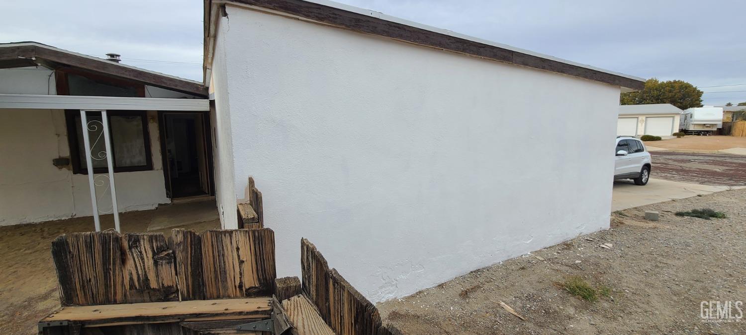 Undisclosed Address Trona, CA 93562 - Photo 5 of 27 a view of a house with wooden wall