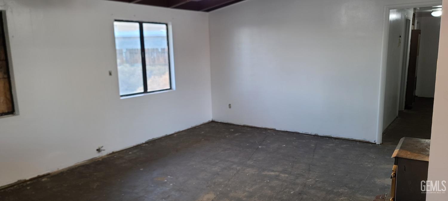 Undisclosed Address Trona, CA 93562 - Photo 8 of 27 an empty room with windows