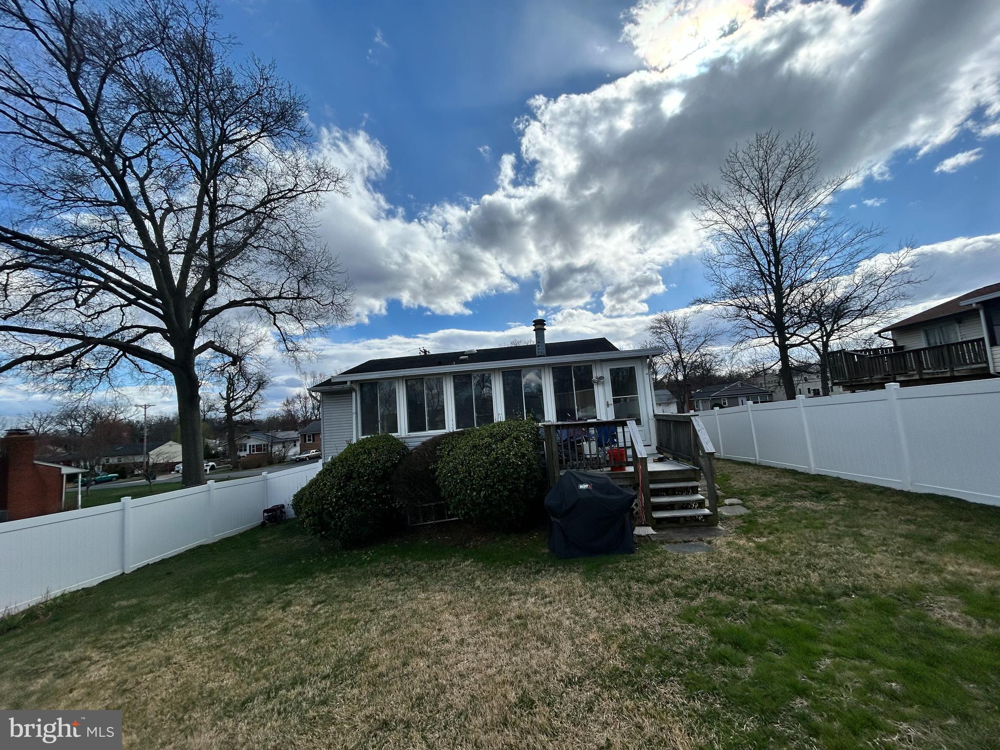 8404 Holly Street Laurel, MD 20707 - Photo 3 of 3 a front view of a house with garden