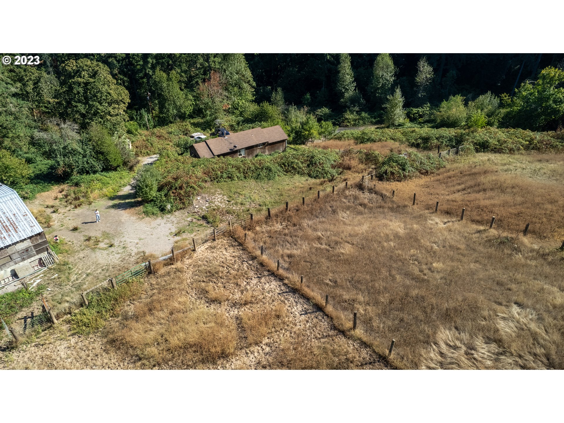 16913 South Hattan Road Oregon City, OR 97045 - Photo 24 of 44 a black and white photo of a house