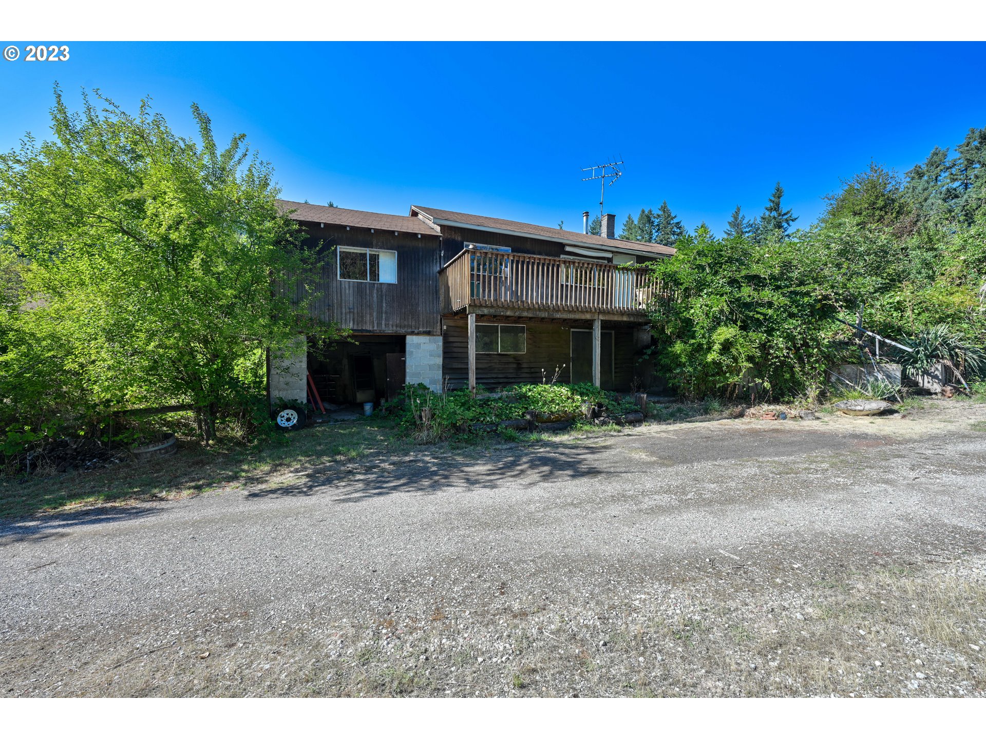 16913 South Hattan Road Oregon City, OR 97045 - Photo 27 of 44 a view of a house with a yard