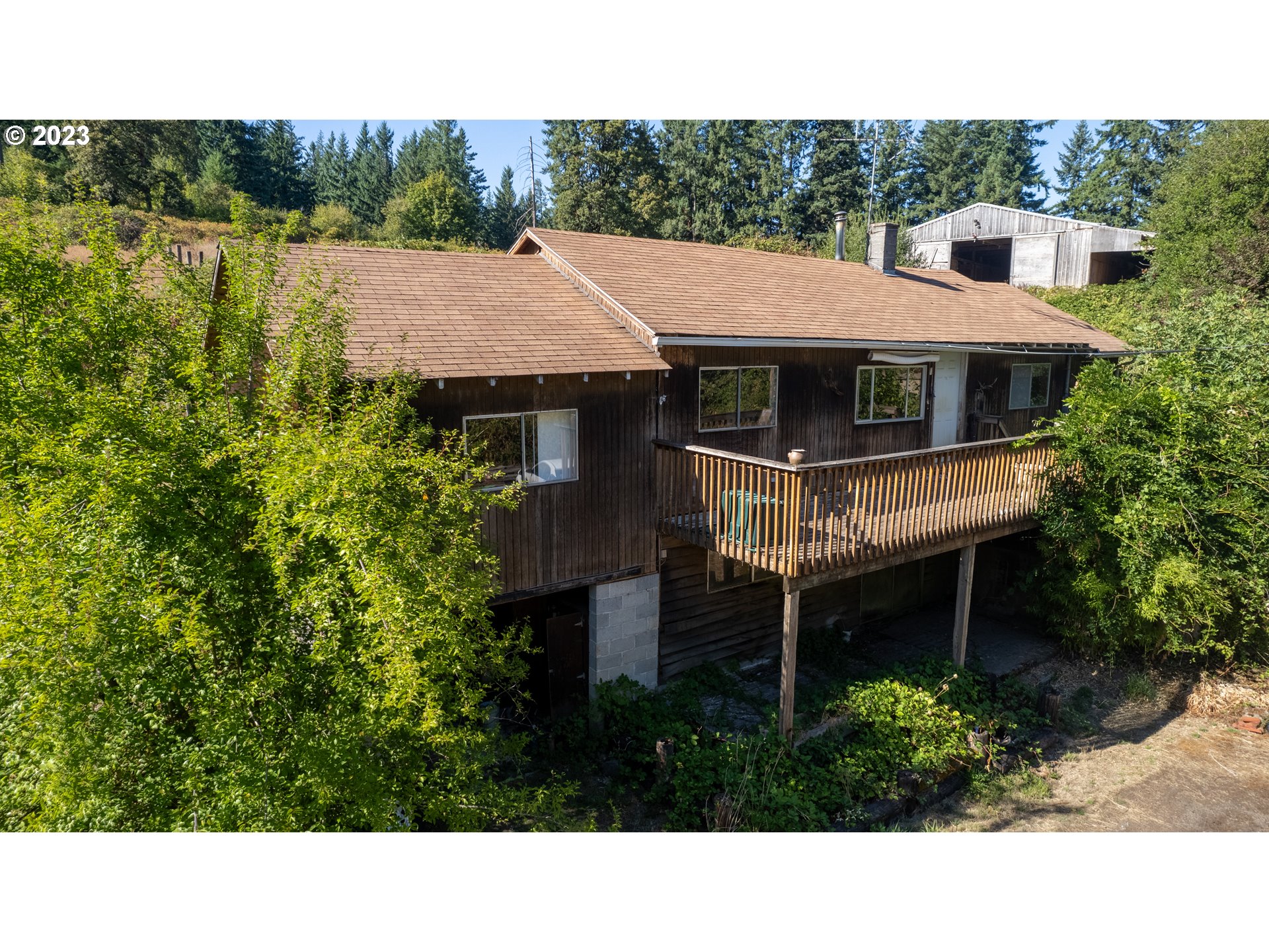 16913 South Hattan Road Oregon City, OR 97045 - Photo 28 of 44 a view of a house with a backyard