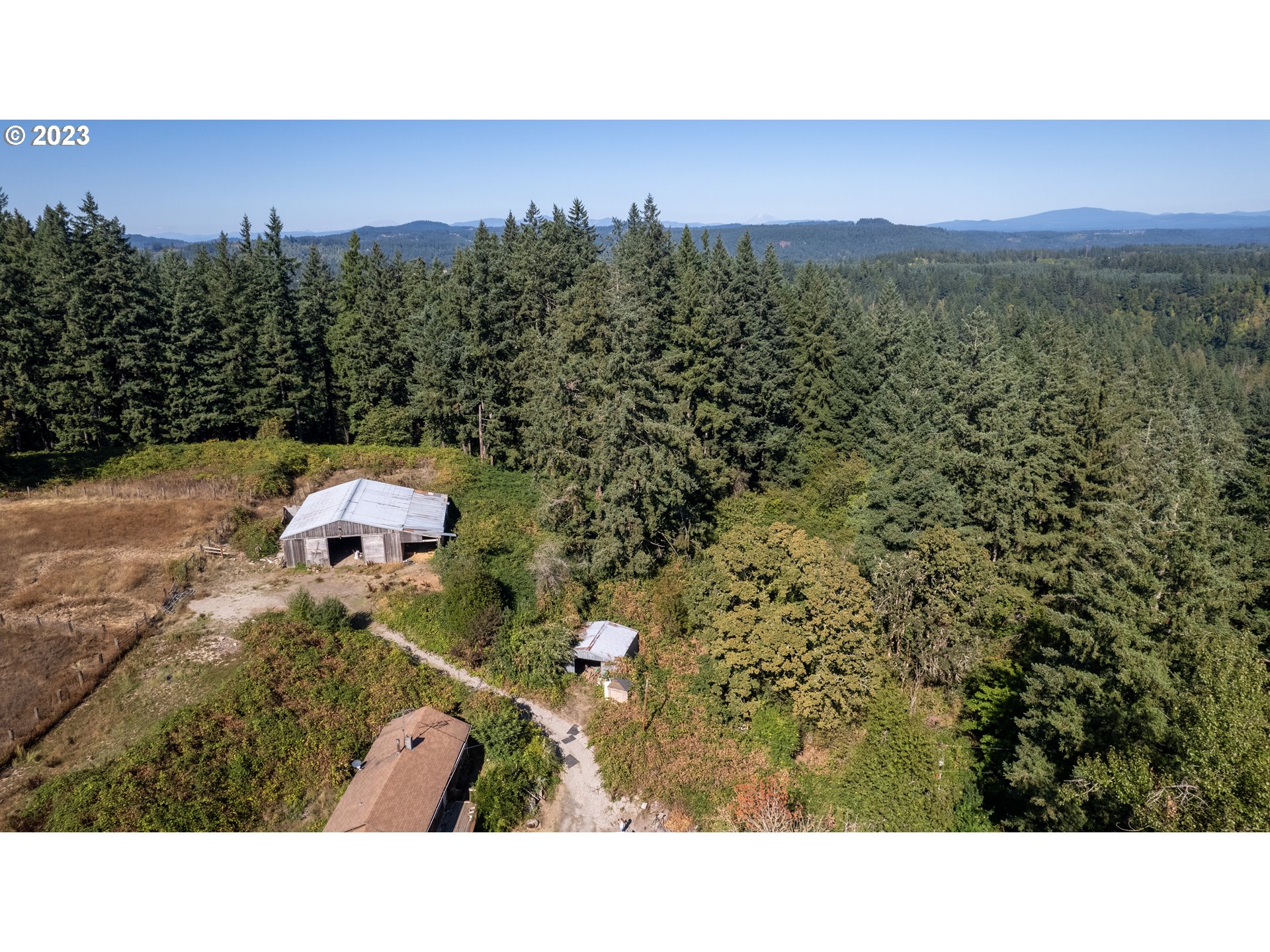 16913 South Hattan Road Oregon City, OR 97045 - Photo 3 of 44 a black and white photo of a city