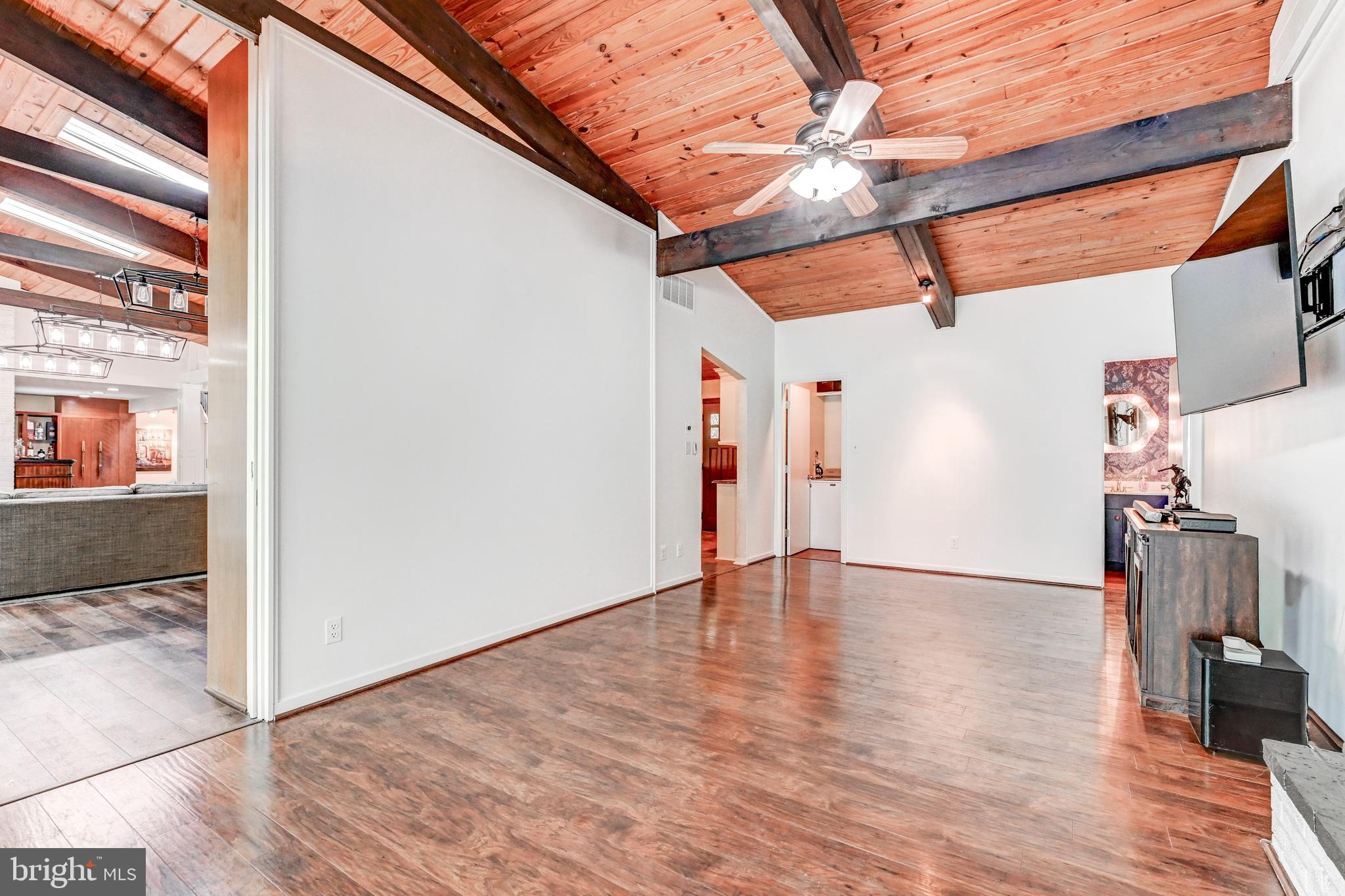3604 Barberry Court Baltimore, MD 21208 - Photo 21 of 48 a view of an empty room with wooden floor