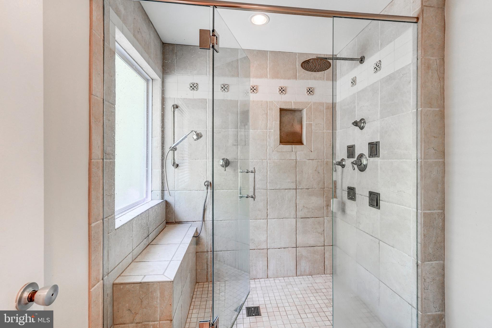 3604 Barberry Court Baltimore, MD 21208 - Photo 27 of 48 a bathroom with a shower and a glass door