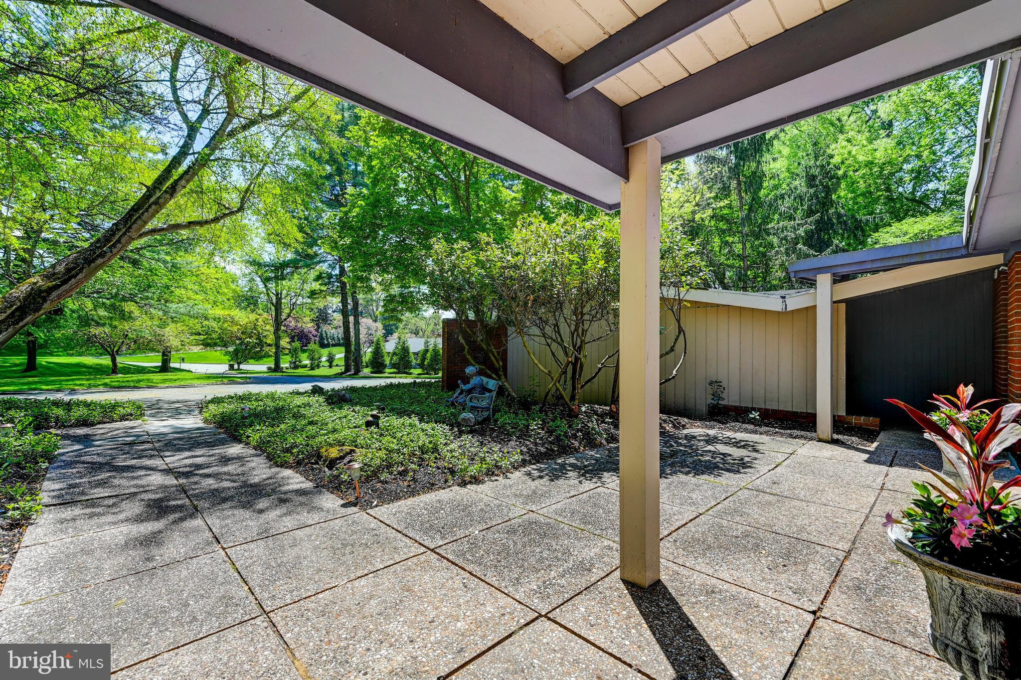 3604 Barberry Court Baltimore, MD 21208 - Photo 4 of 48 a view of a porch with furniture and garden