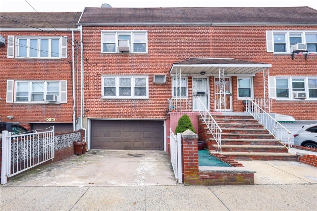 90-14 Spritz Road Queens, NY 11417 - Photo 1 of 1 a front view of a house