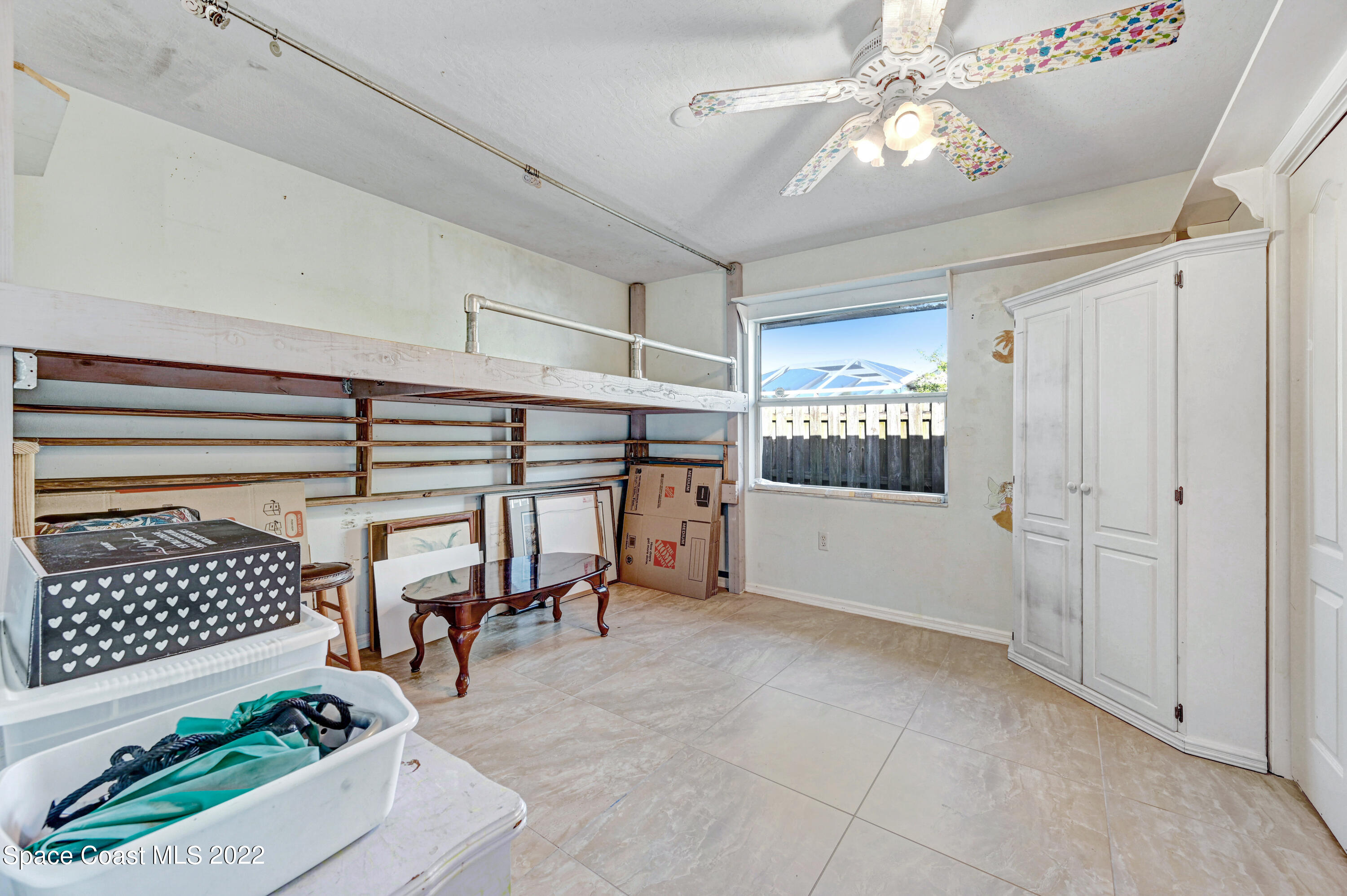1924 Glen Meadows Circle Melbourne, FL 32935 - Photo 19 of 27 a view of an empty room with a window