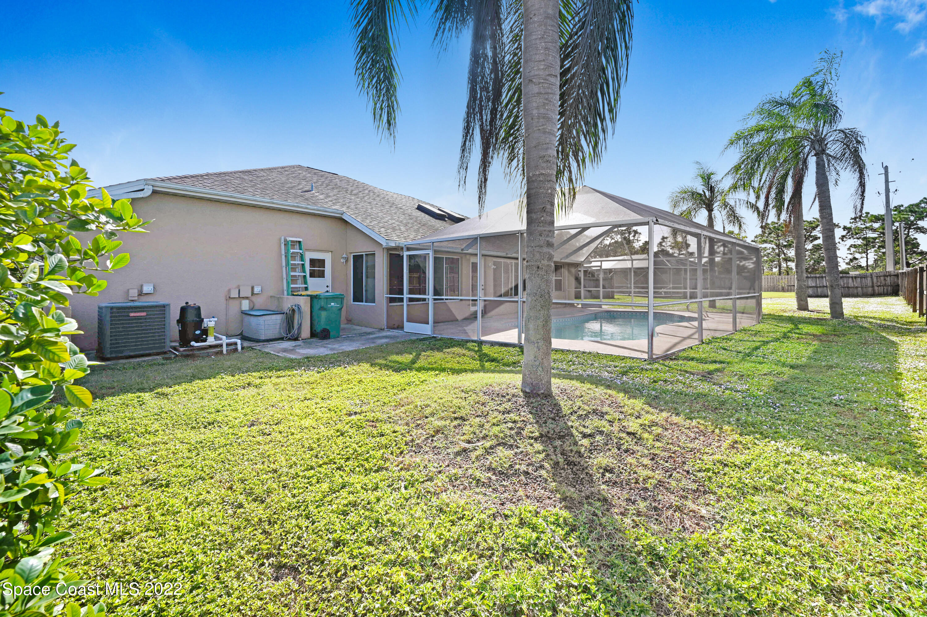 1924 Glen Meadows Circle Melbourne, FL 32935 - Photo 27 of 27 a view of a house with a backyard
