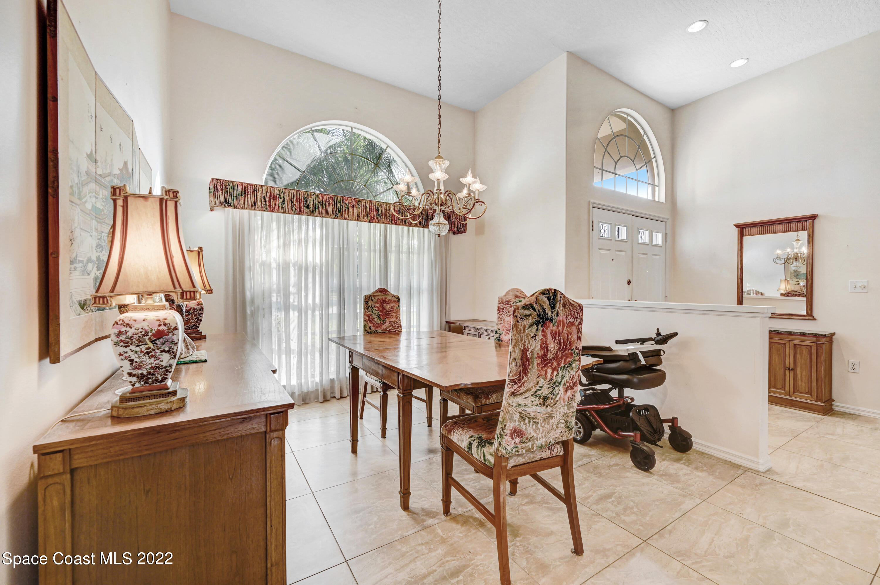 1924 Glen Meadows Circle Melbourne, FL 32935 - Photo 3 of 27 a workspace with furniture and window
