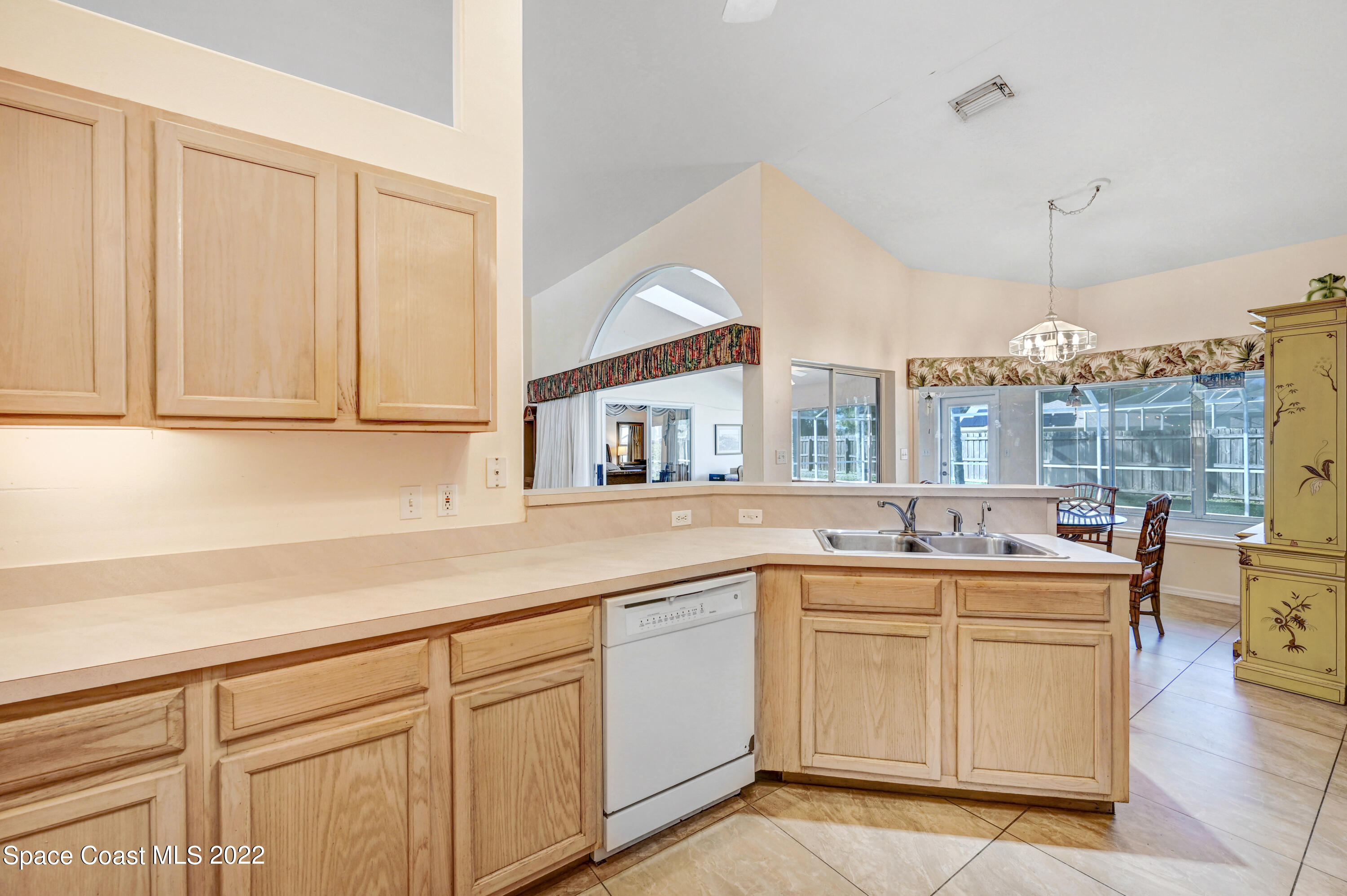1924 Glen Meadows Circle Melbourne, FL 32935 - Photo 7 of 27 a kitchen with a sink and cabinets