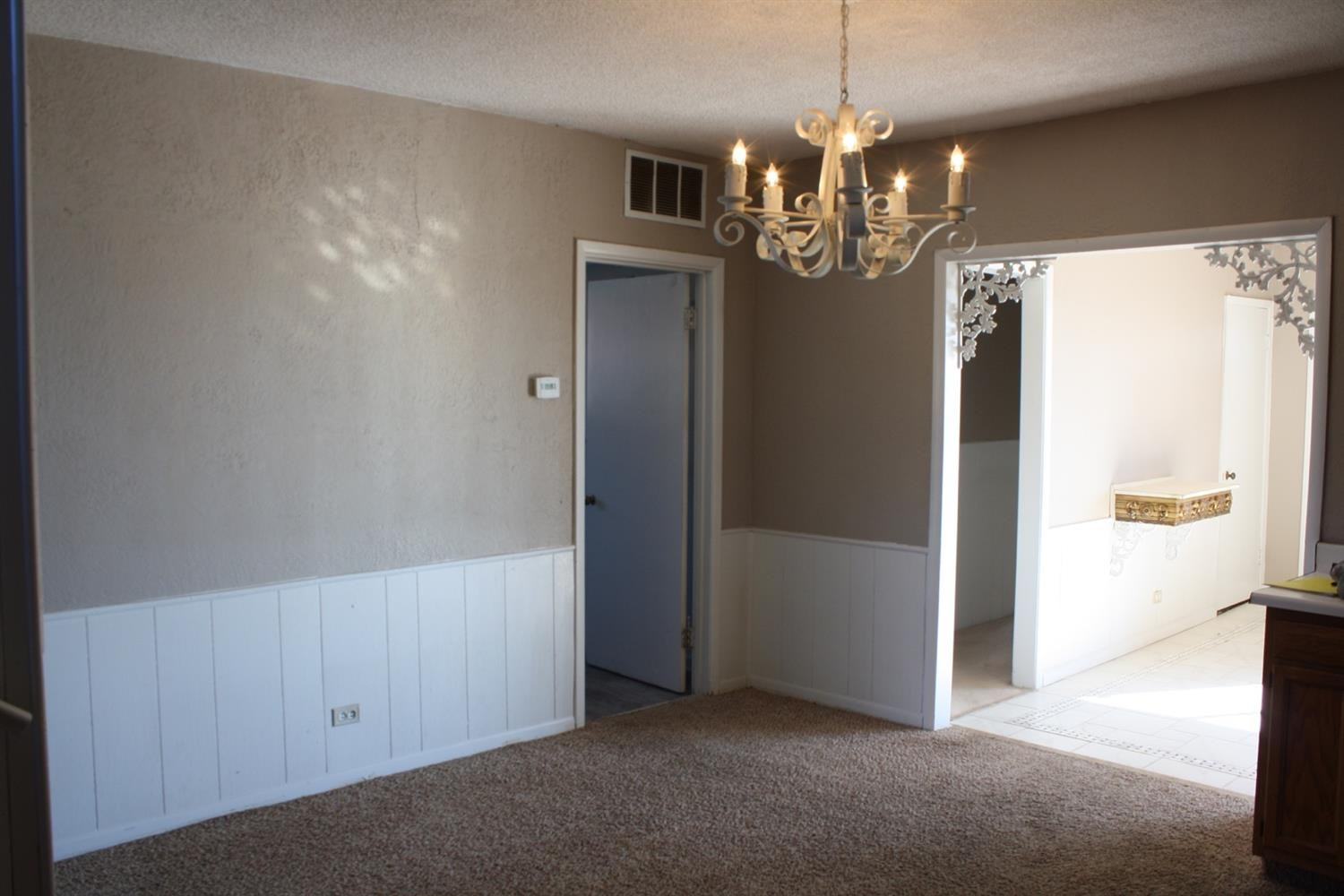 306 West 34th Plainview, TX 79072 - Photo 14 of 36 a view of a chandelier in big room and chandelier