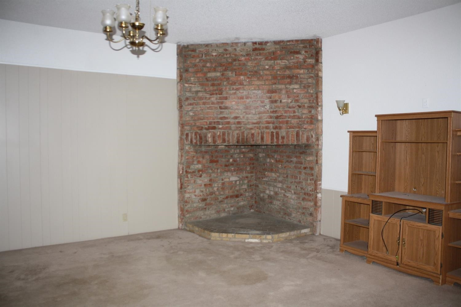 306 West 34th Plainview, TX 79072 - Photo 16 of 36 view of a room with a fireplace