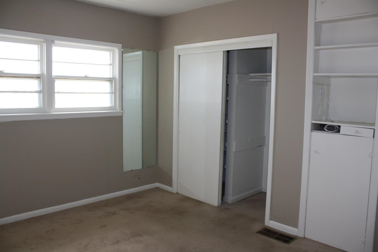 306 West 34th Plainview, TX 79072 - Photo 20 of 36 an empty room with windows
