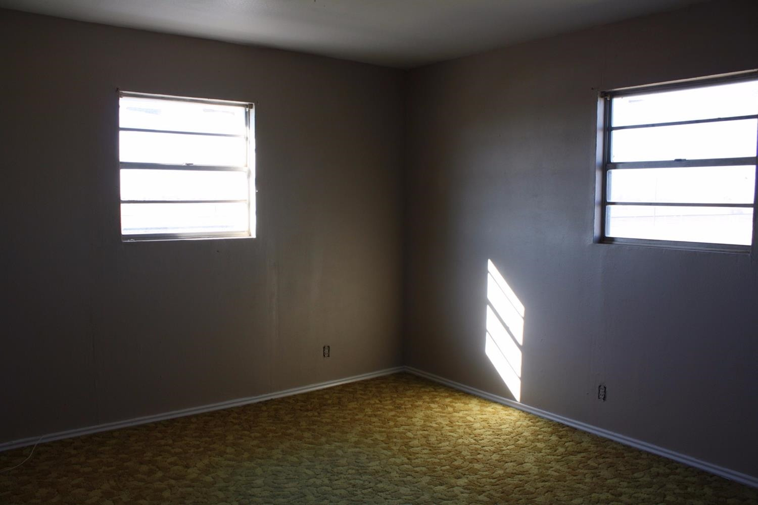 306 West 34th Plainview, TX 79072 - Photo 26 of 36 an empty room with a window