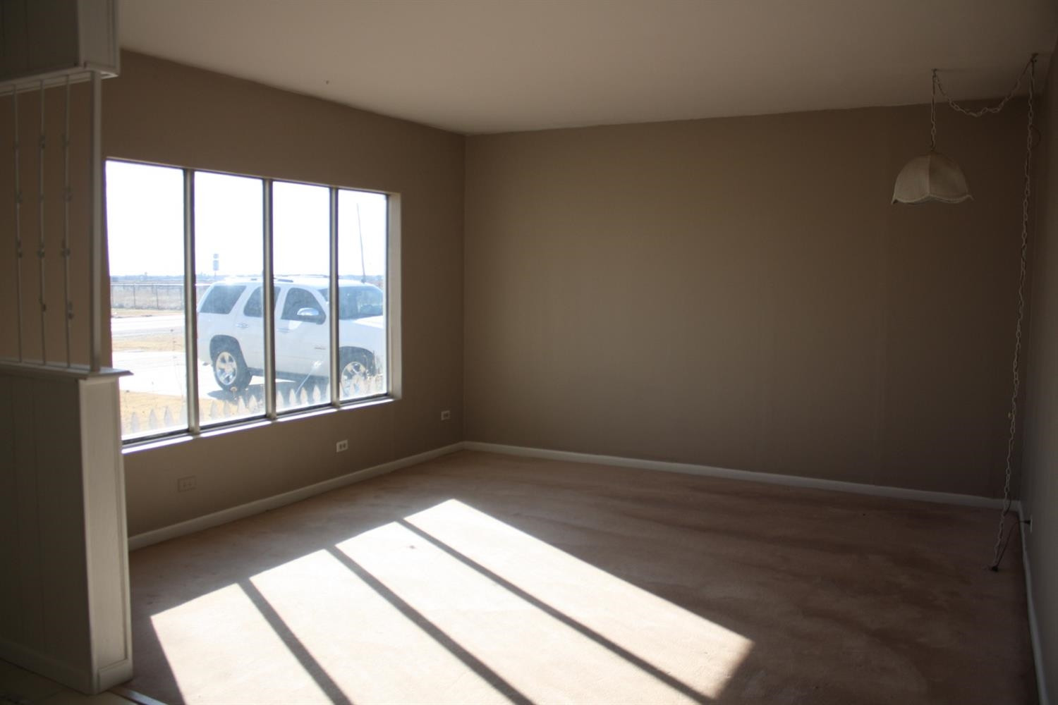 306 West 34th Plainview, TX 79072 - Photo 4 of 36 a view of empty room with window