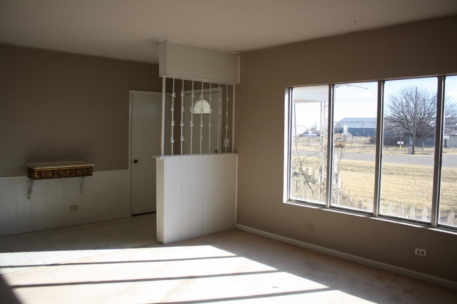306 West 34th Plainview, TX 79072 - Photo 5 of 36 a view of a room that has a window in it
