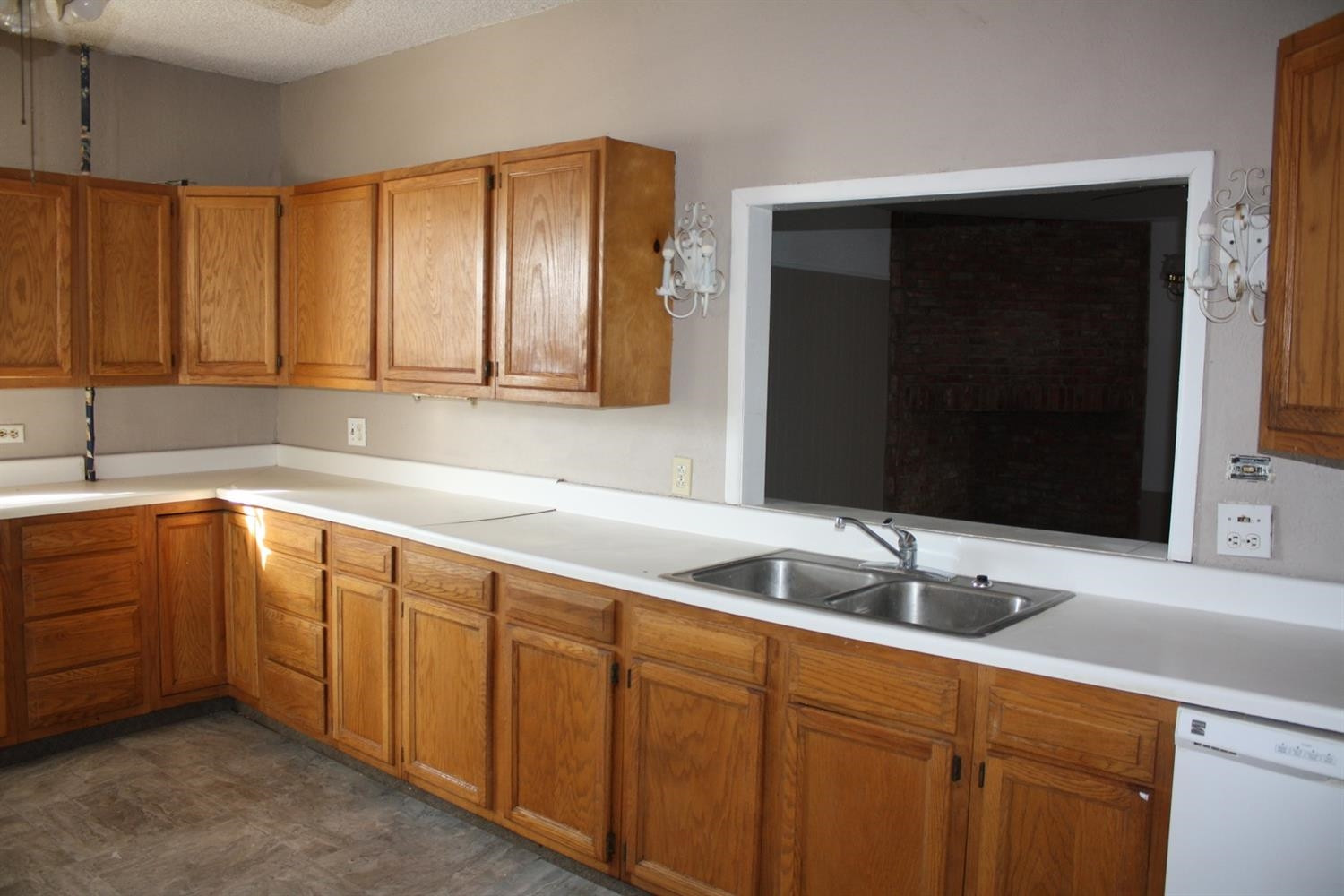 306 West 34th Plainview, TX 79072 - Photo 9 of 36 a bathroom with a sink and a large mirror
