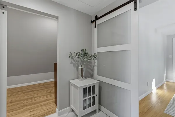 a view of small space with wooden floor