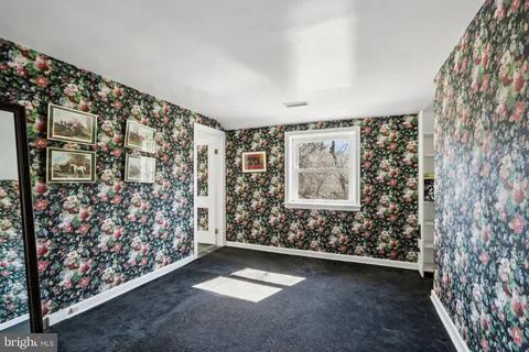 a view of entryway with stairs and furniture