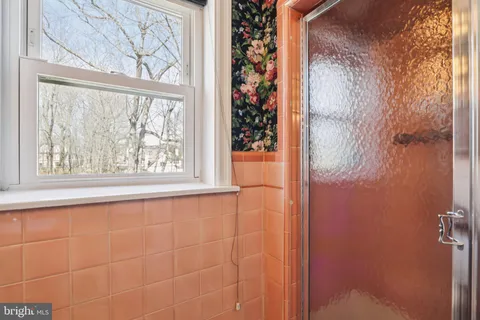 a view of a big room with wooden door