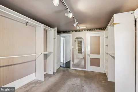 a view of an empty walk in closet