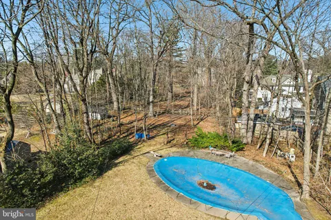 a house view with a backyard space