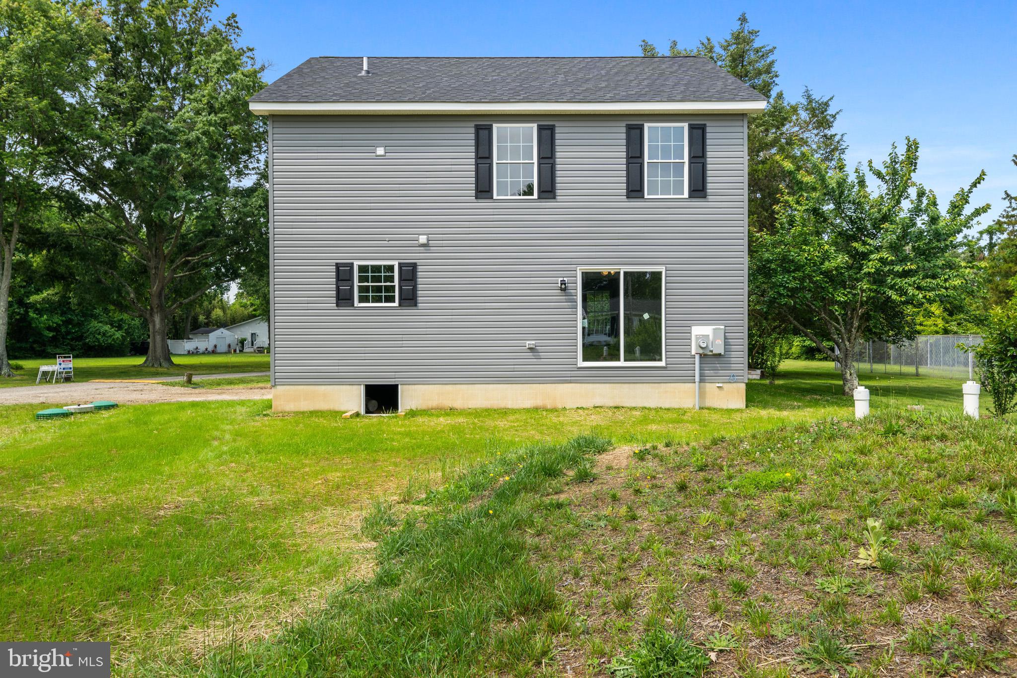 24215 Thistle Place Chaptico, MD 20621 - Photo 32 of 40 a house that has a yard