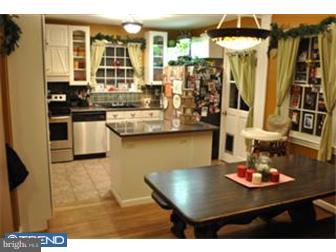 201 Stone Road Lindenwold, NJ 08021 - Photo 2 of 12 a kitchen with a sink and cabinets