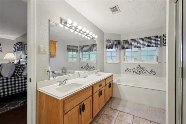 a utility room with a sink washer and dryer