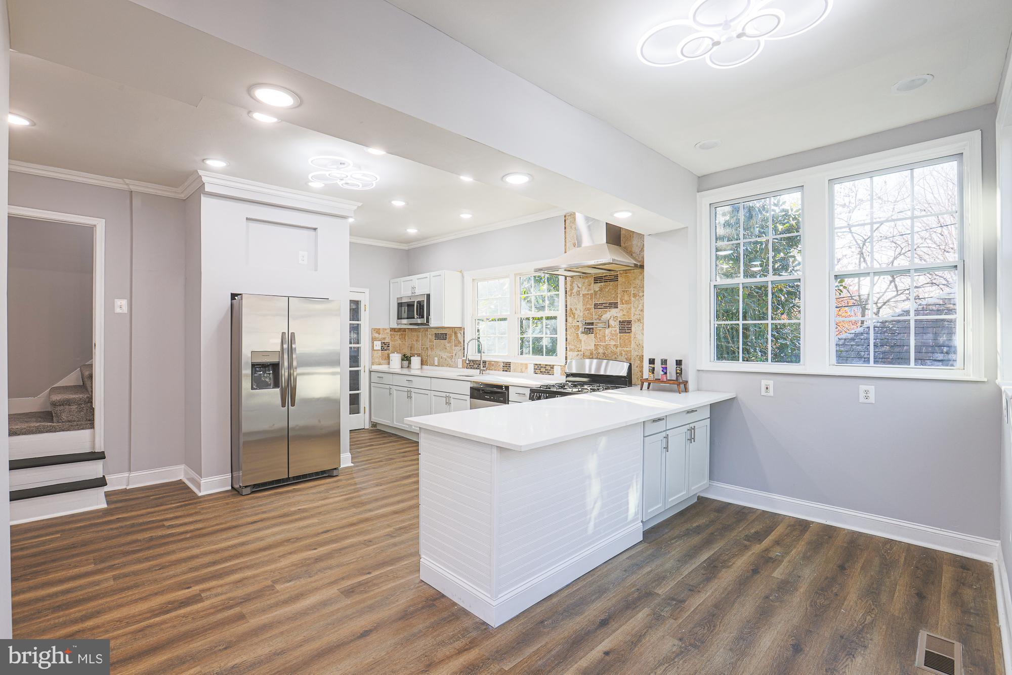 Bright, modern kitchen with open layout.