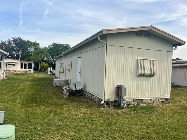 a house with garden in front of it