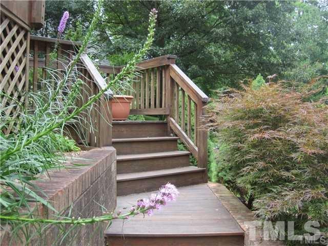 4505 Cobbler Place Raleigh, NC 27613 - Photo 2 of 13 a view of stairs and flowers