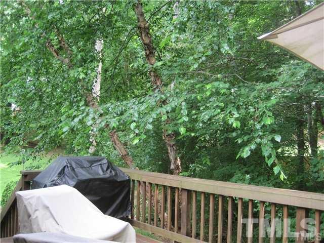 4505 Cobbler Place Raleigh, NC 27613 - Photo 12 of 13 a view of a balcony with wooden floor and fence