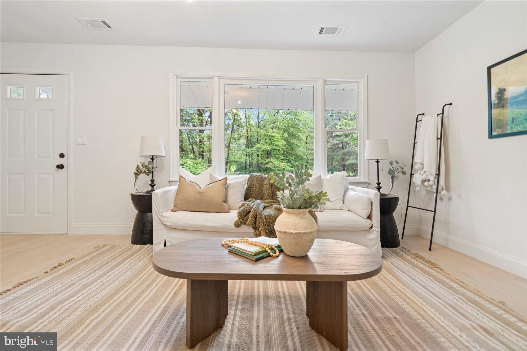 4566 Hickory Lane Mount Airy, MD 21771 - Photo 15 of 45 a view of a dining room with furniture window and wooden floor