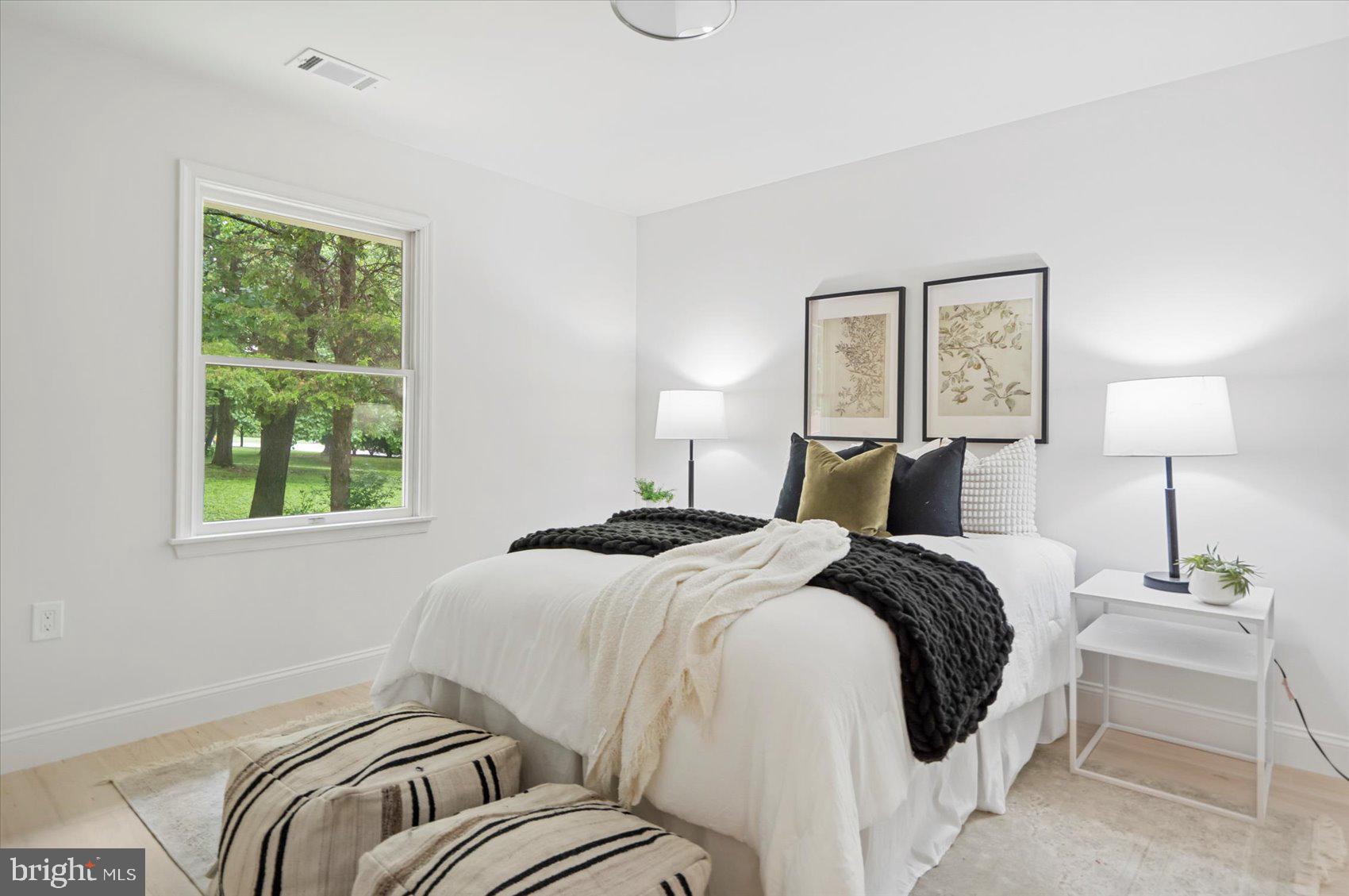 4566 Hickory Lane Mount Airy, MD 21771 - Photo 28 of 45 a bedroom with a bed and a window
