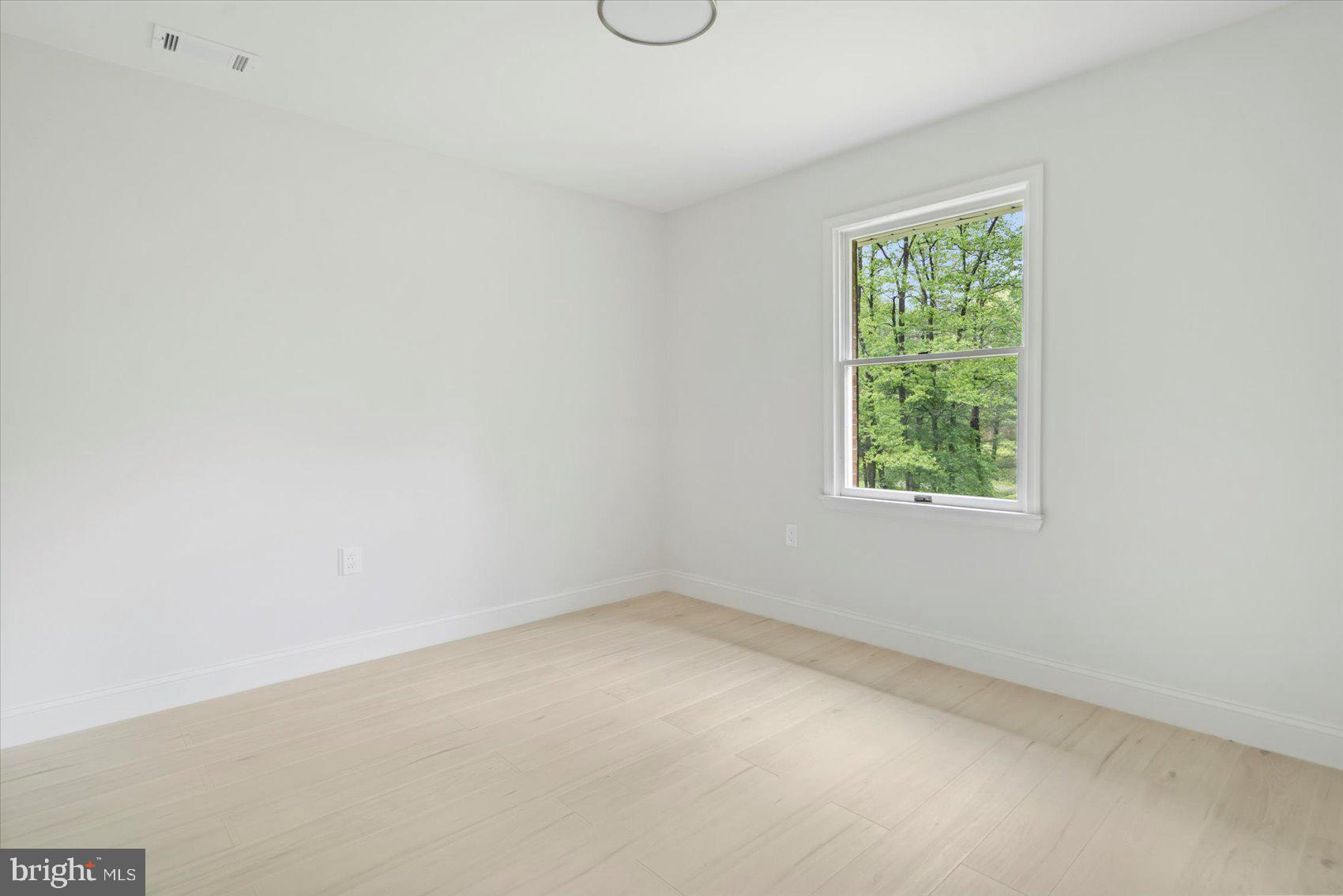 4566 Hickory Lane Mount Airy, MD 21771 - Photo 32 of 45 an empty room with a window
