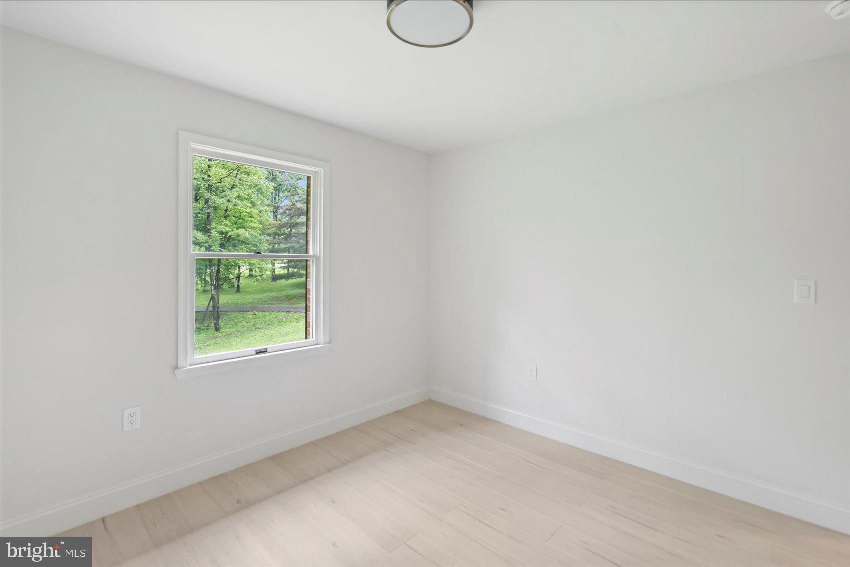 4566 Hickory Lane Mount Airy, MD 21771 - Photo 33 of 45 an empty room with a window