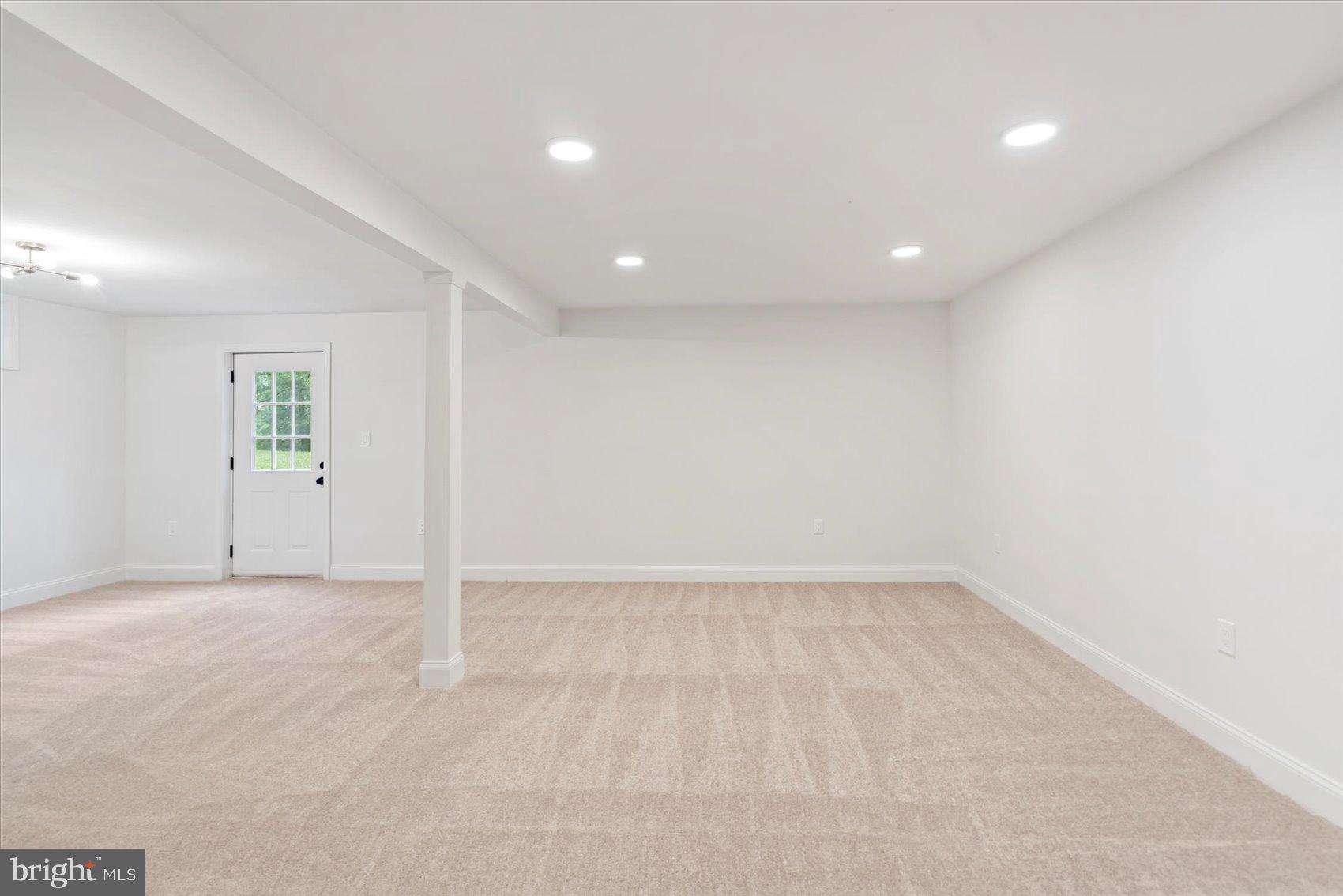 4566 Hickory Lane Mount Airy, MD 21771 - Photo 37 of 45 an empty room with a natural light