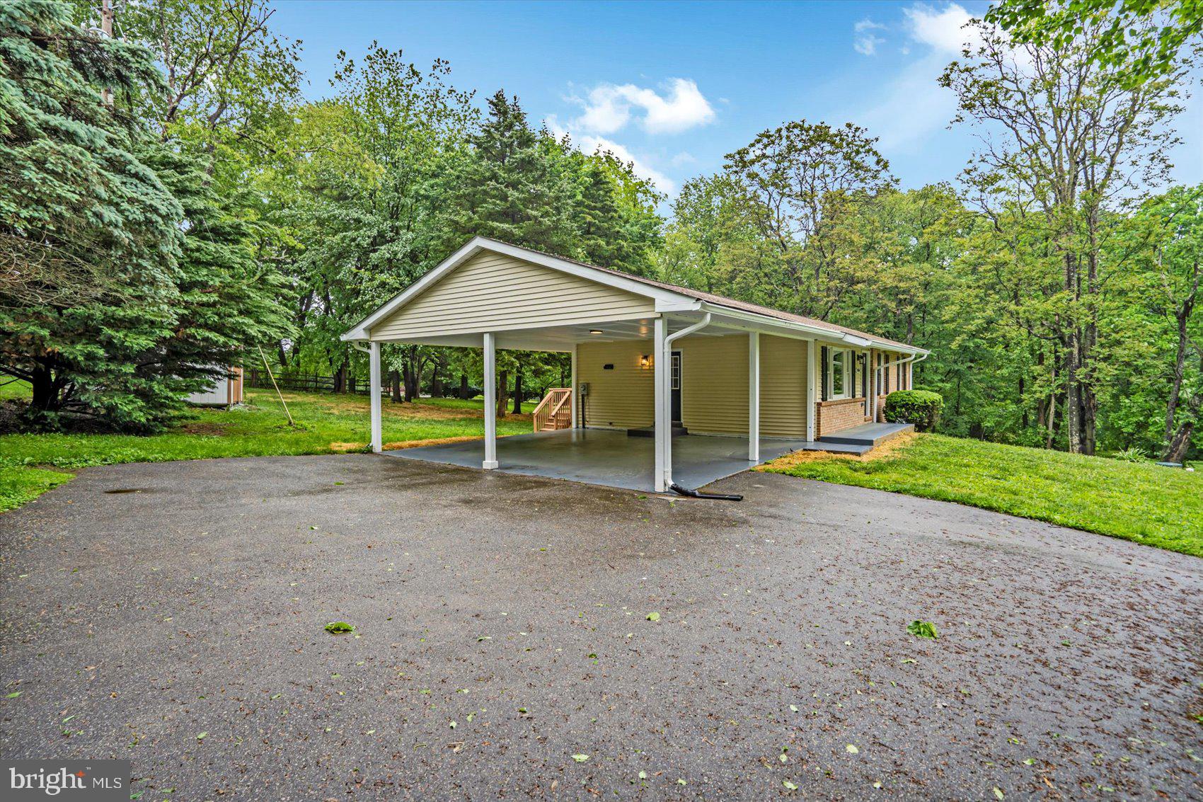 4566 Hickory Lane Mount Airy, MD 21771 - Photo 4 of 45 a view of a house with a yard and tree s