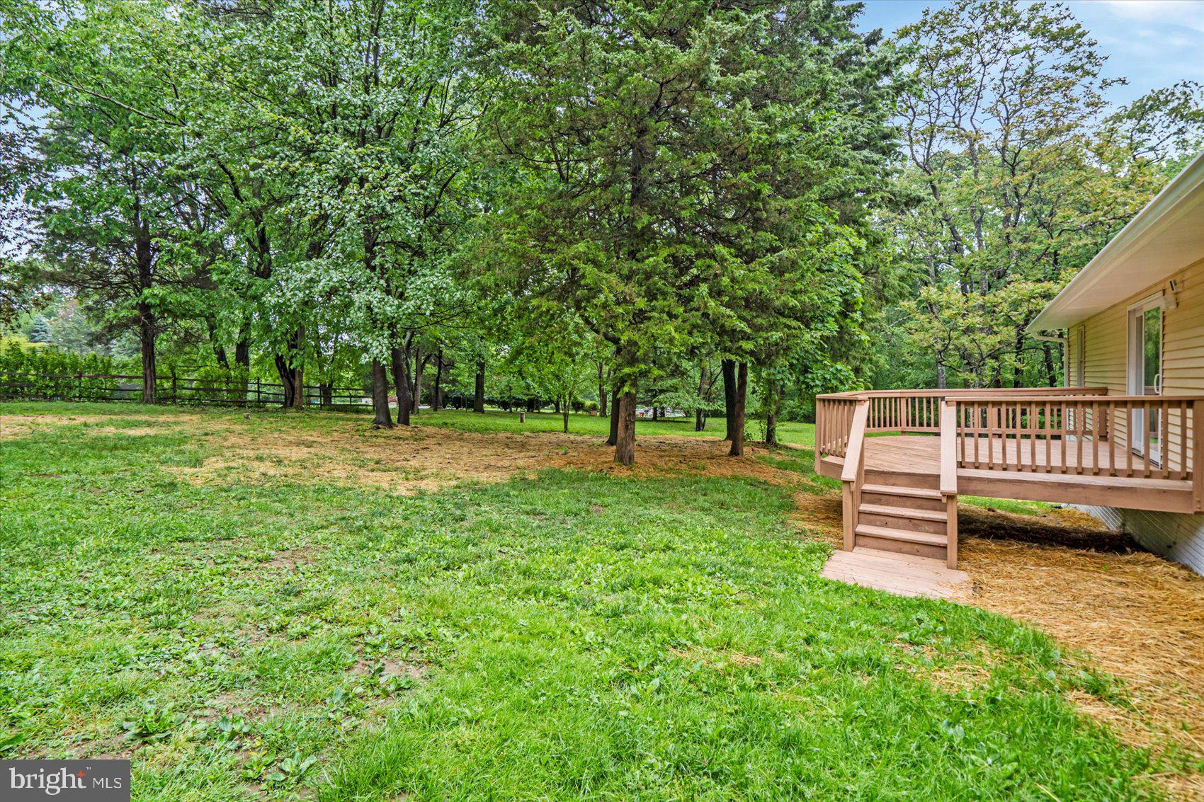 4566 Hickory Lane Mount Airy, MD 21771 - Photo 8 of 45 a view of outdoor space with deck and yard