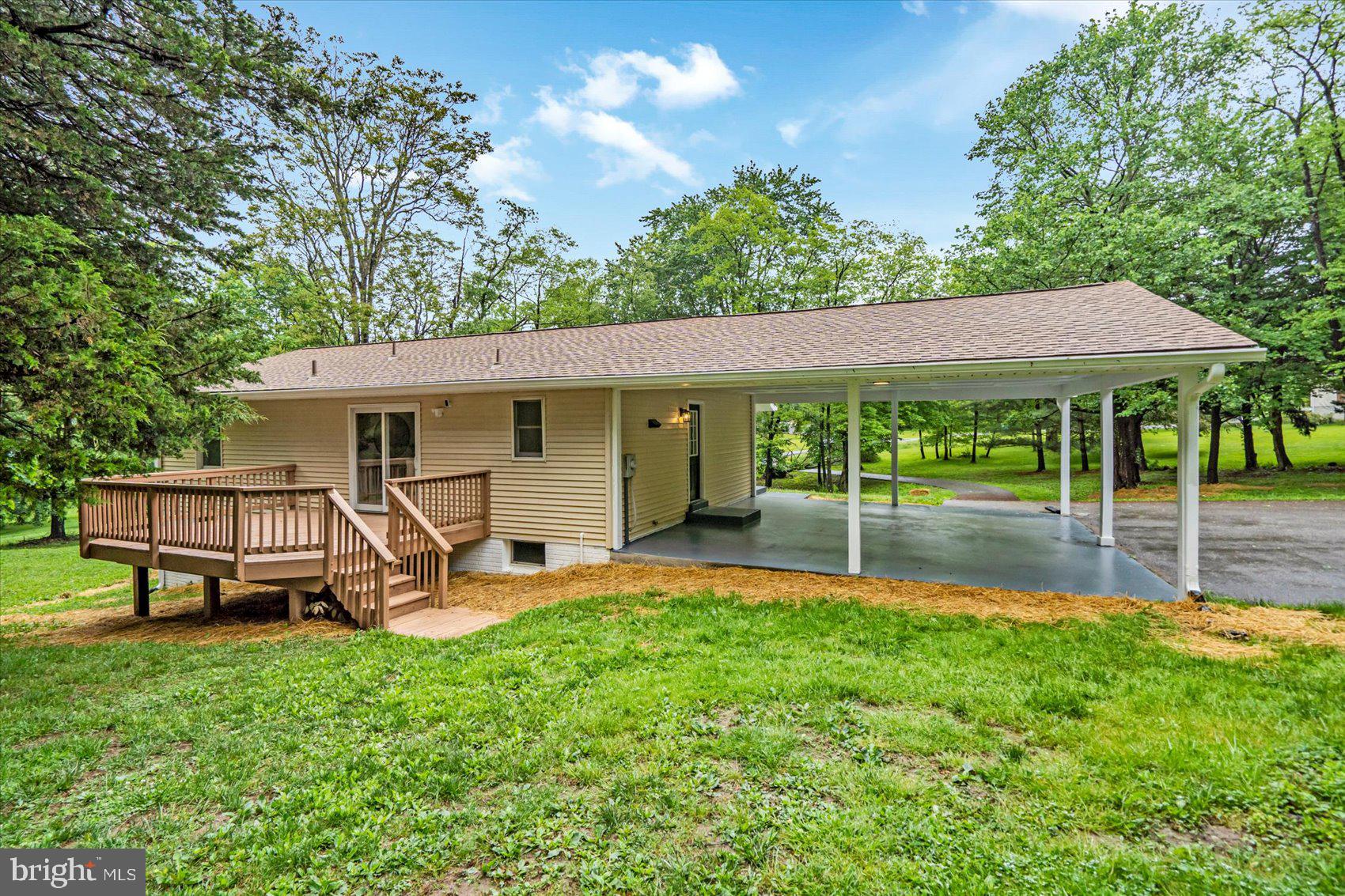 4566 Hickory Lane Mount Airy, MD 21771 - Photo 9 of 45 a view of a house with backyard and a patio