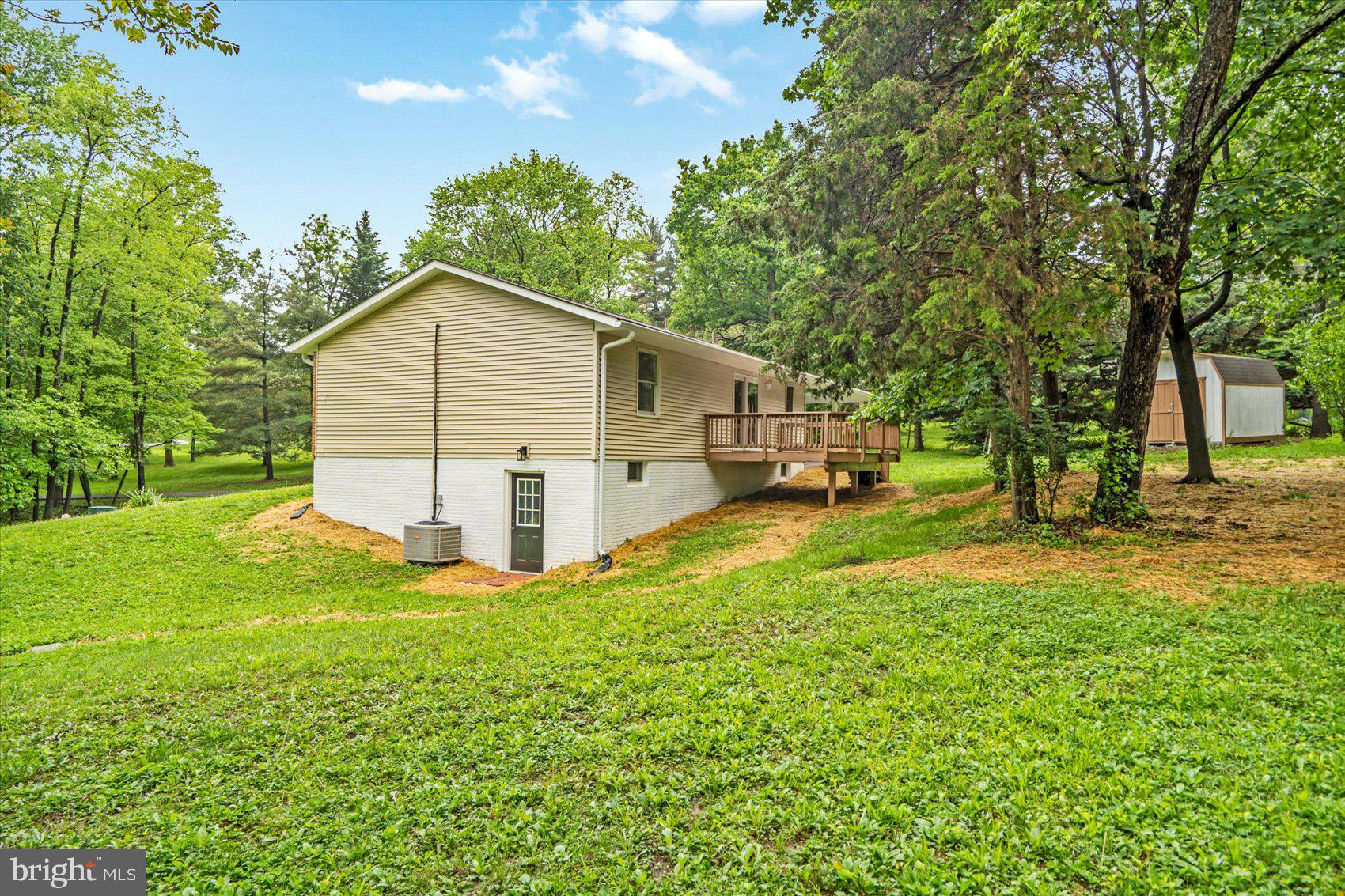 4566 Hickory Lane Mount Airy, MD 21771 - Photo 10 of 45 a view of a house with backyard