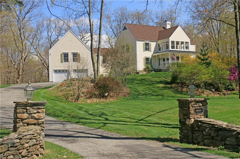 14 Ridge Road New Milford, CT 06776 - Photo 1 of 1 a front view of a house with a yard