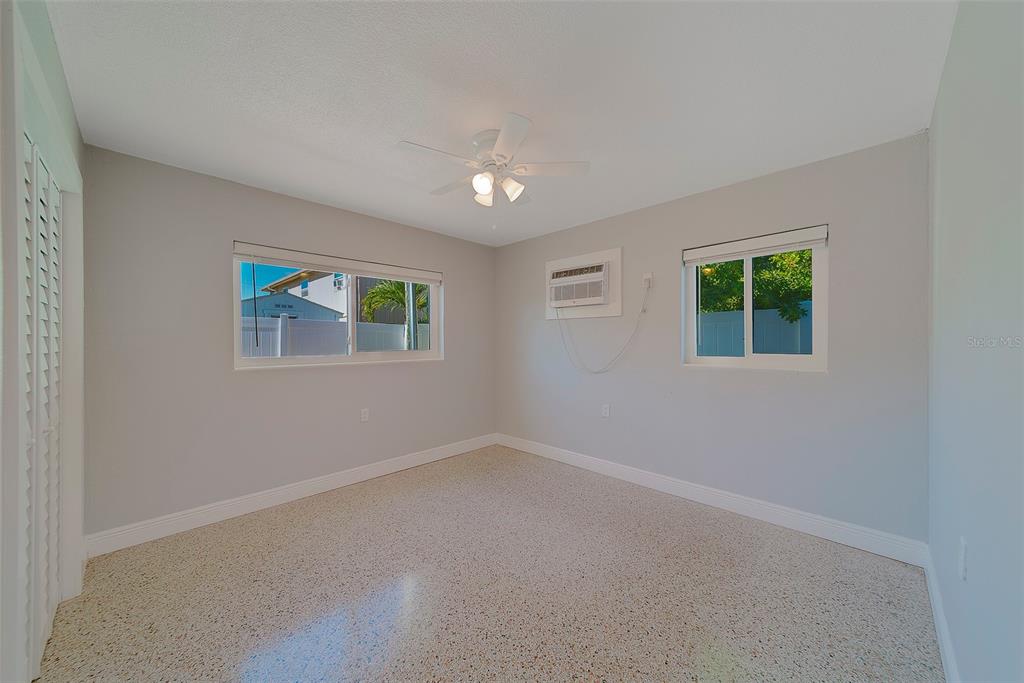 13248 4th Street East, Unit B Madeira Beach, FL 33708 - Photo 16 of 49 an empty room with windows